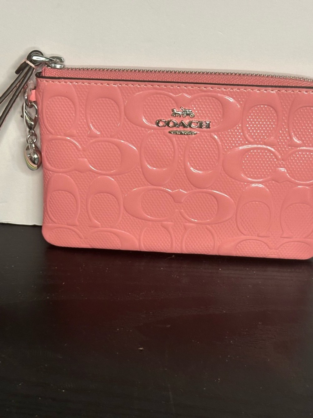 Corner Pink Patent Zip Embossed Wristlet In Signature Leather With Heart Charm - Picture 3 of 9